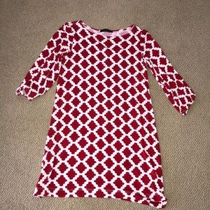 Hourglass knit shift dress.